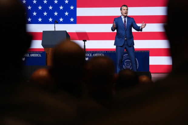 US Secretary of Defense Pete Hegseth addresses senior military officers at Marine Corps Base Quantico in Quantico, Virginia, on Sept. 30, 2025. (Photo by Andrew Harnik/AFP via Getty Images)